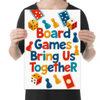 Person holding the board games bring us together poster to show its layout