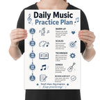 Person holding the daily music practice plan poster to show its layout