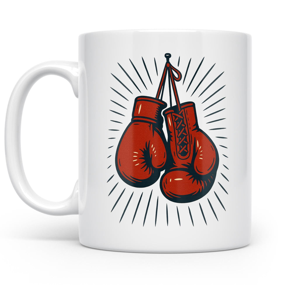 White ceramic mug with red boxing gloves and black vintage-style sunburst lines