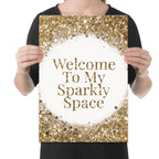 Welcome To My Sparkly Space poster with gold glitter-style printed borders around elegant lettering on white, shown held for scale